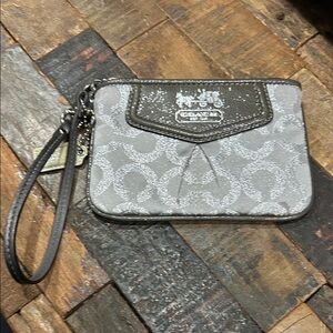 Coach metallic silver signature C canvas & leather small wristlet. Preloved